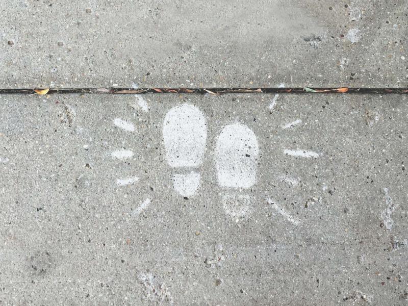 Footprints painted onto the pavemet