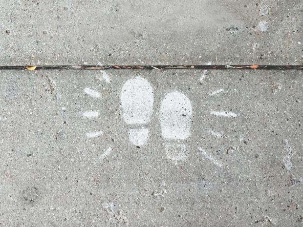 Footprints painted onto the pavemet